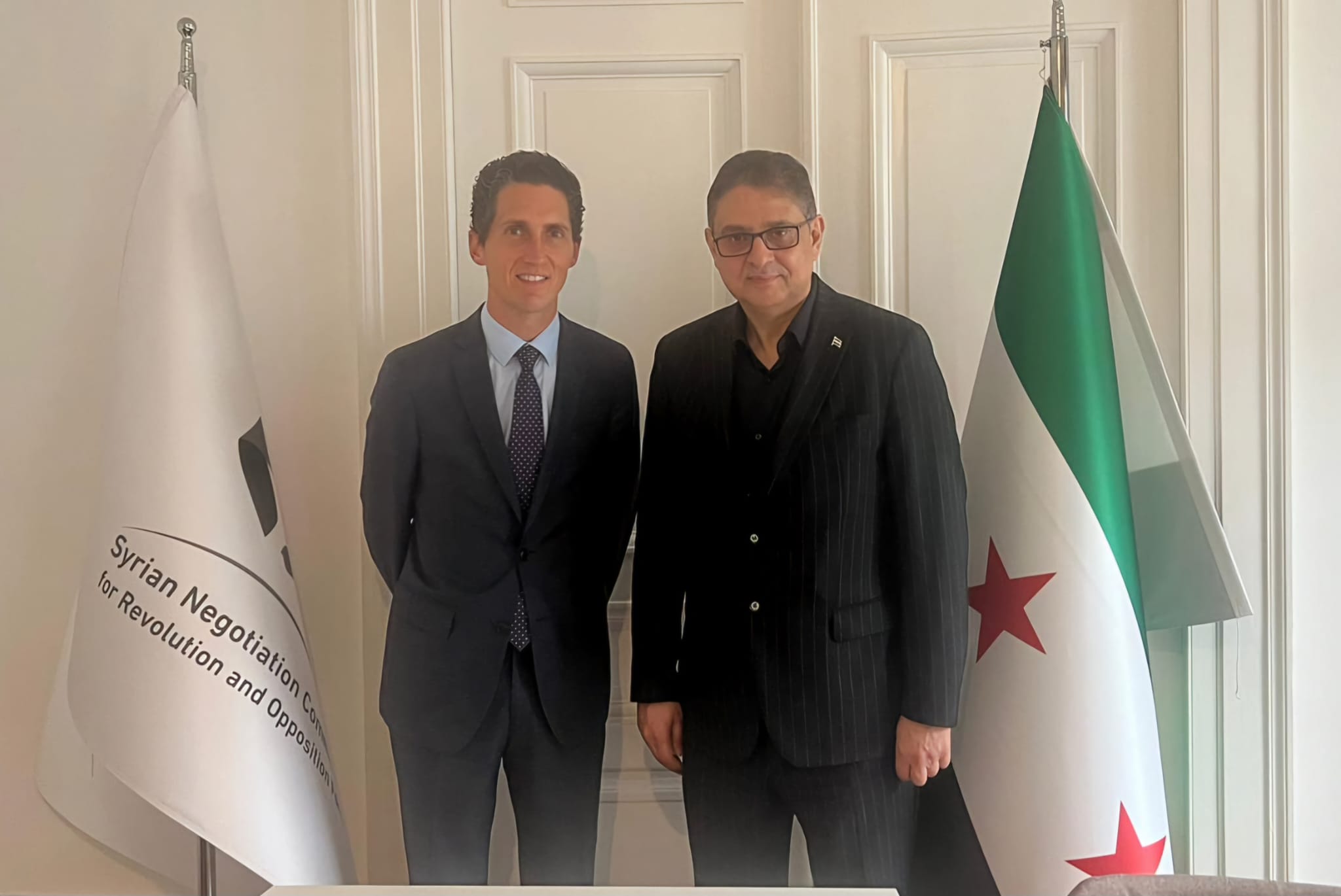 The head of the SNC meets the official in charge of the Syria file, at the French UN mission.. and discusses